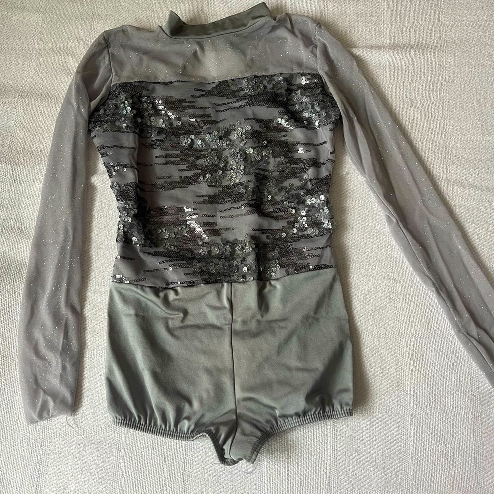 Girls dance costume with 2 skirts. Worn only once for recital. Dry cleaned.